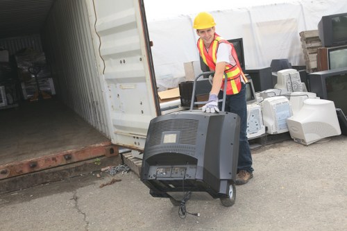 Movers handling furniture with care during relocation